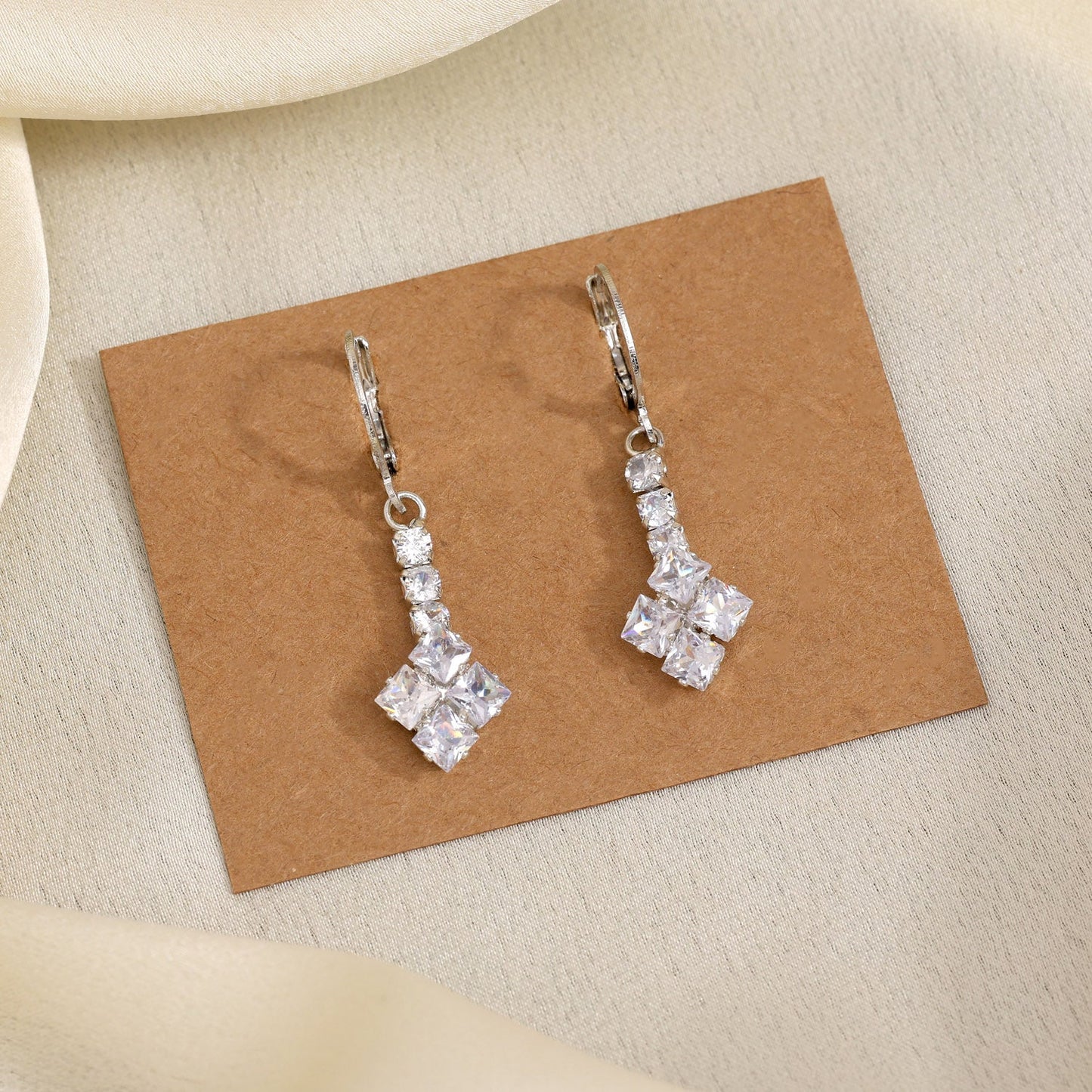 Lustrous Silver Color Antique Stone Earrings With Classic Filigree Settings - Preyans.com