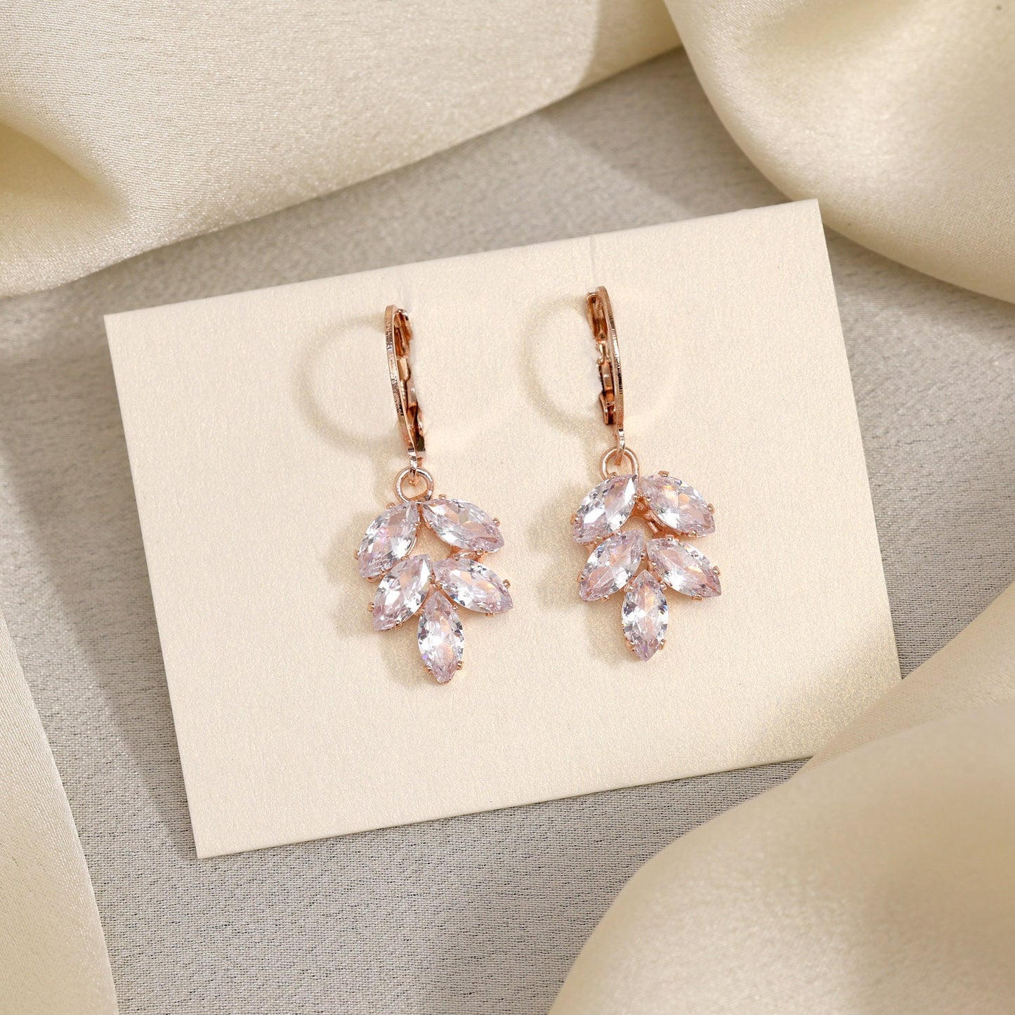 White Color Antique Stone Earrings Featuring Ornate Patterns And Vintage Vibes - Preyans.com