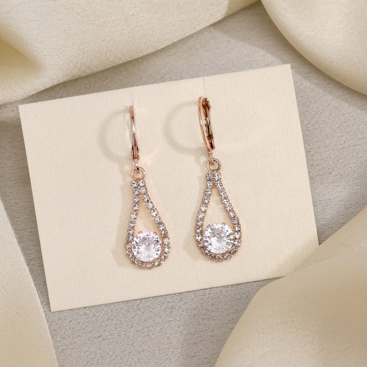 Whispers Of Elegance In White Color Antique Stone Earrings For Women - Preyans.com