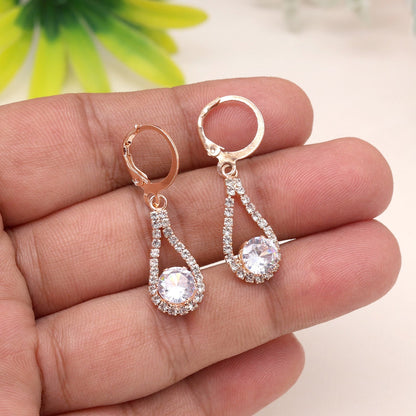 Whispers Of Elegance In White Color Antique Stone Earrings For Women - Preyans.com