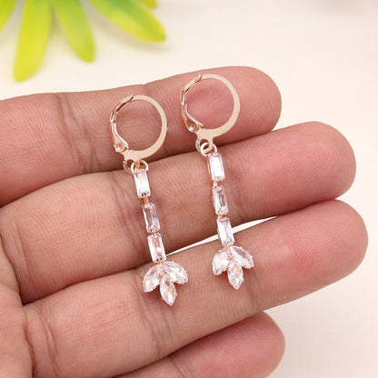 Ethereal White Color Antique Stone Earrings With Classic Design Motifs - Preyans.com