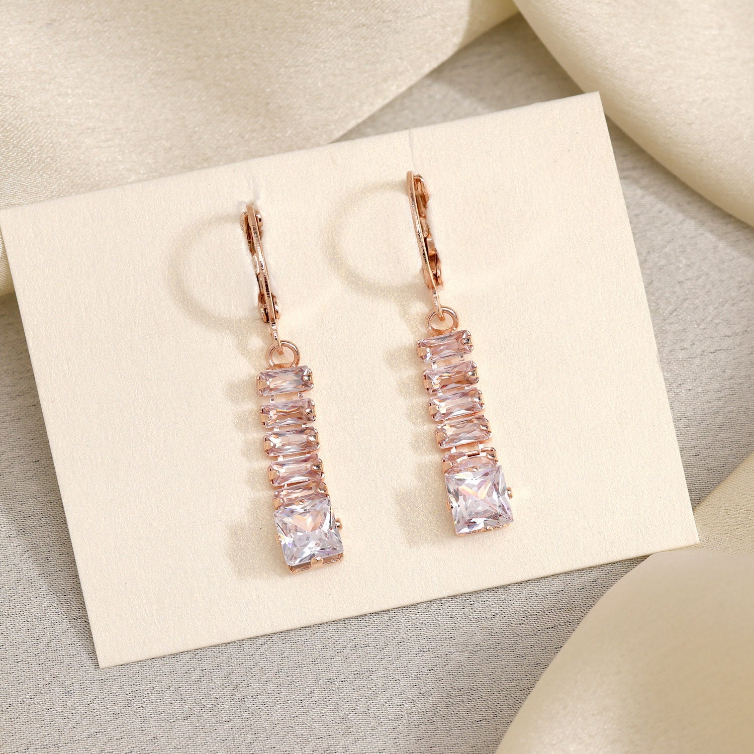 Glowing In Elegance: White Color Antique Stone Earrings With Lush Finish - Preyans.com