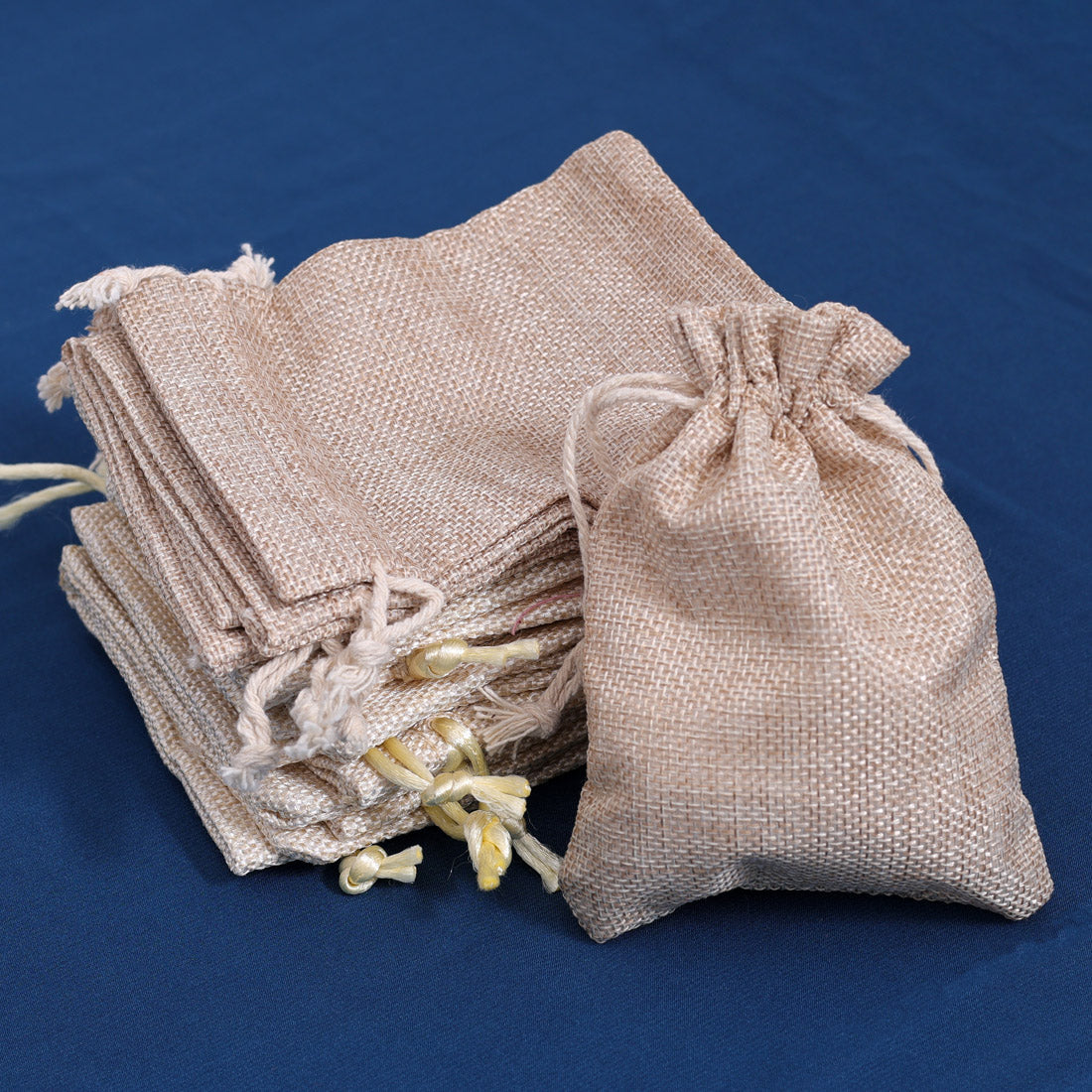 Cream & Beige Color 15 Pieces Of Jute Potli Bags (PTB222CMB) - preyans.com